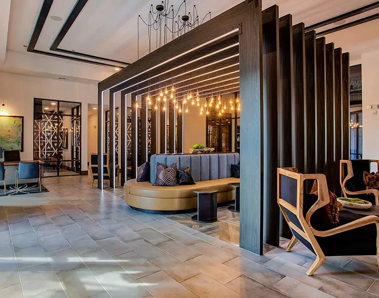 Lounge area featuring heavy timber pergola structure with integrated LED lighting